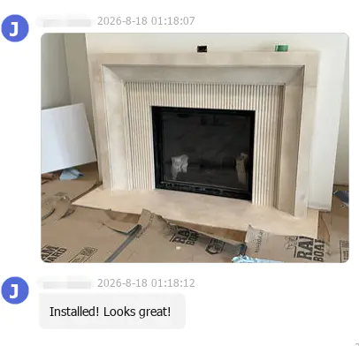 Che aspetto ha la cornice di un caminetto in marmo personalizzata dalla progettazione all'installazione?